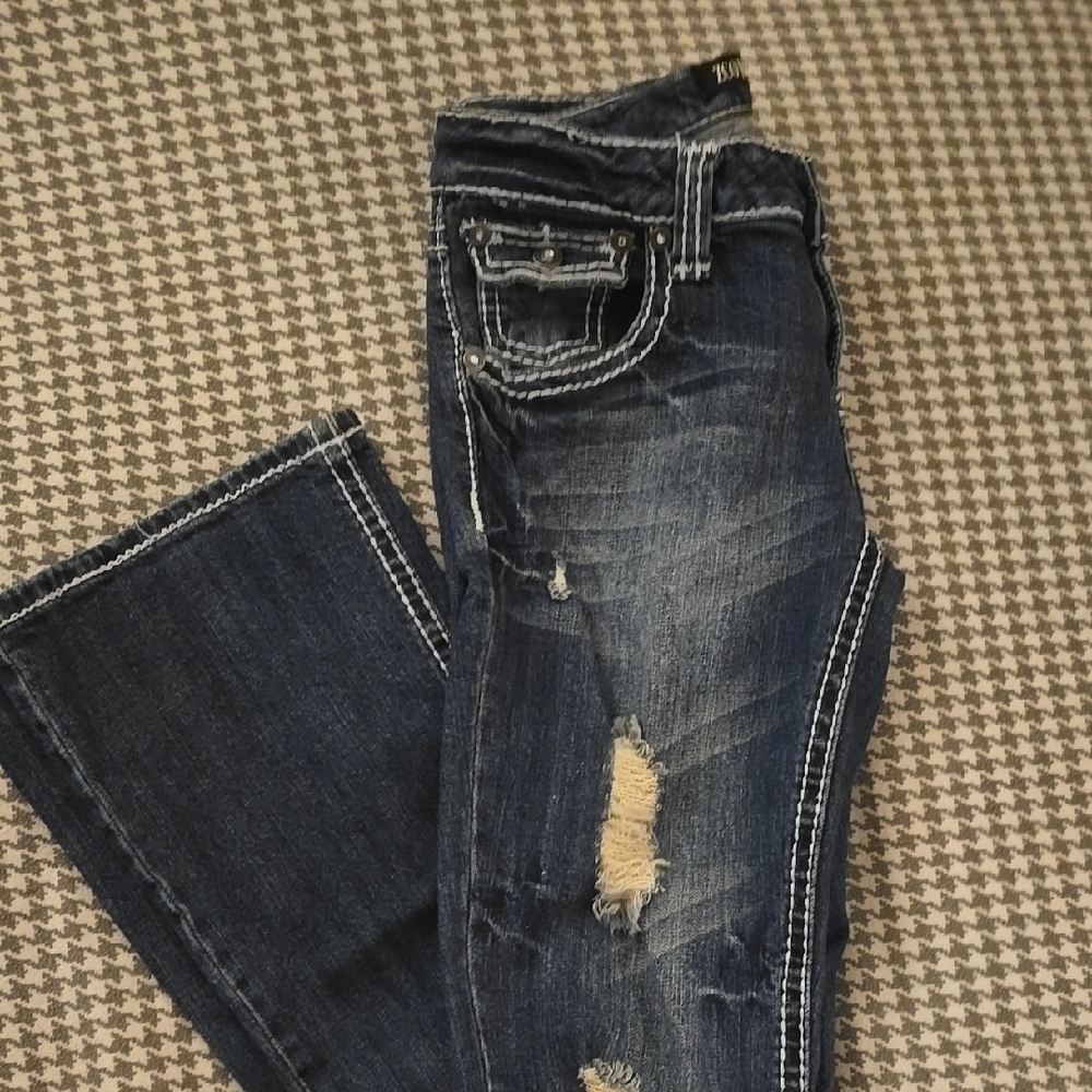 Blue Boot Cut Jeans with Distressing and White Stitching